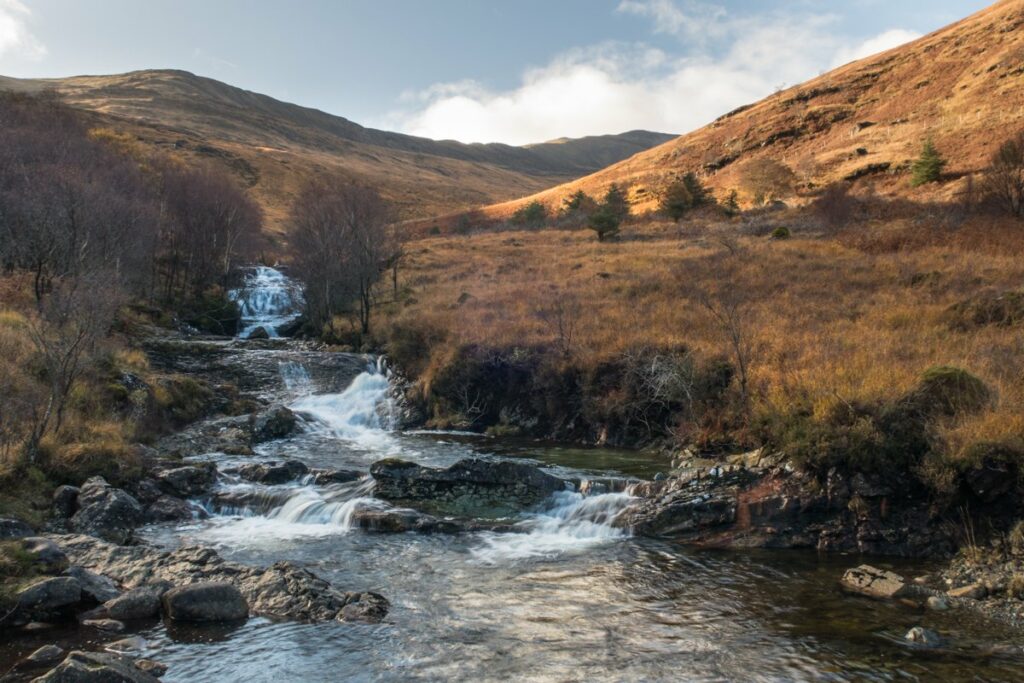 Scallastle River waterfall with hills beyond in autumn/winter