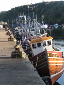 Tobermory pier with fishing boats
