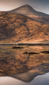 Ben more reflecting in Loch Scridain