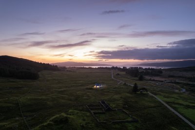 Kilbeg Lodge from above as the sunset lights up the island's coastline