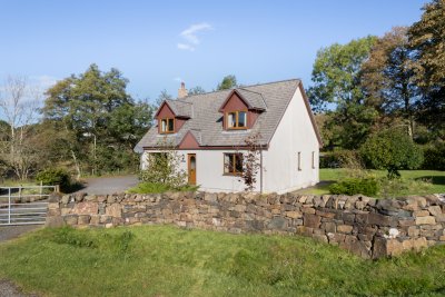 Corrieyairack with a stone wall and garden