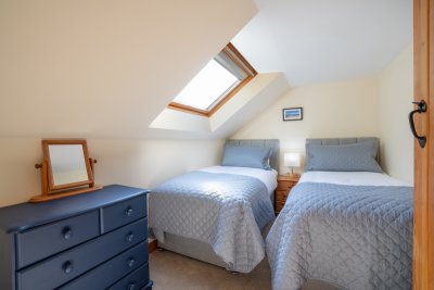 The cosy twin room enables groups of six to stay