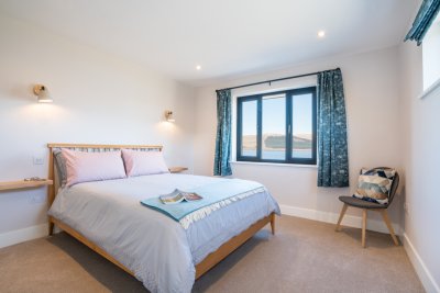 Wake up to beautiful sea views from the en-suite master bedroom
