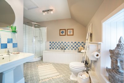 Enjoy the spacious Jack and Jill bathroom on the upper floor, serving the two double bedrooms upstairs