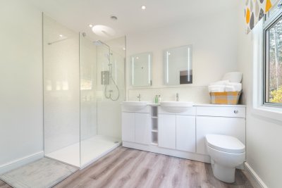 Indulge with a walk-in shower and twin basins in the twin bedroom en-suite