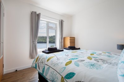 The second double bedroom also has wonderful sea views