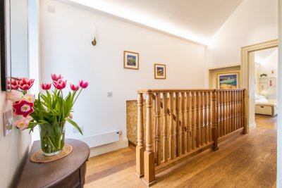 Staircase leading to the bedroom, garden room and bathroom