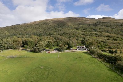 Coorie Doon's scenic setting in the grounds of Torlochan House