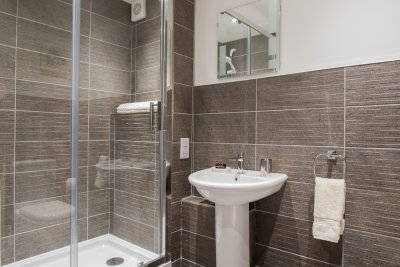 Make use of the modern and stylish bathroom with large shower