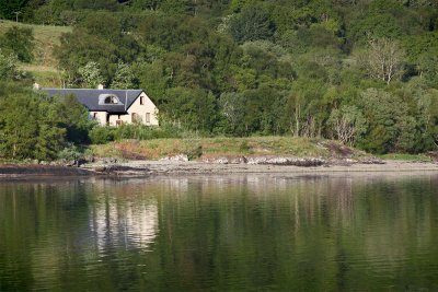 Daisy Cottage seen from across the bay