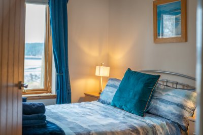 Enjoy lovely views over the bay from the bedroom