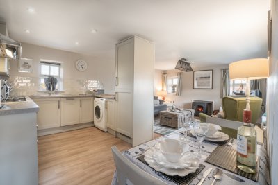 The kitchen and dining area create a lovely sociable feel