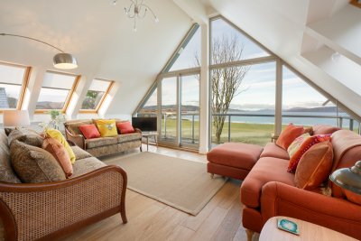 Soak up the sea views to the mainland beyond from the upstairs living room