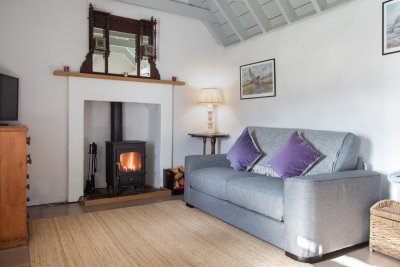 Wood burning stove in the cottage with fuel provided