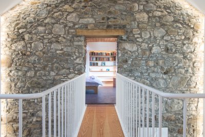 Elevated walkway leading to master double bedroom