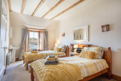 The twin bedroom offers spacious accommodation for two 