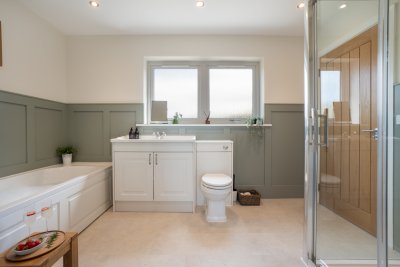 This Jack-and-Jill style en-suite serves the ground floor master bedroom