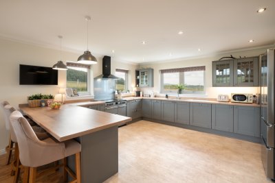 The breakfast bar and open-plan layout feels wonderfully sociable