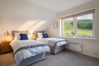 The cosy twin bedroom at Kilbeg Lodge