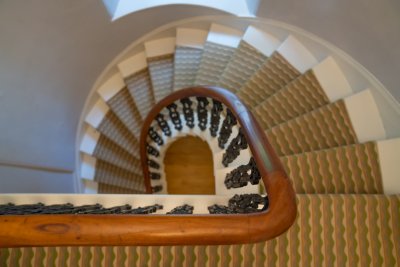 The sweeping staircase takes centre stage in the spacious entrance hall