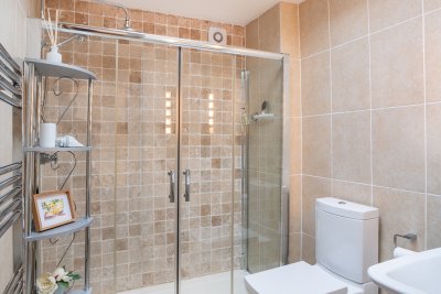 The spacious shower room on the upper floor of the cottage