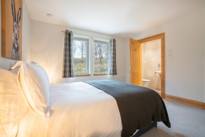 This double bedroom also comes with its own luxurious en-suite bathroom