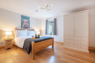 The bright and welcoming master bedroom, with en-suite
