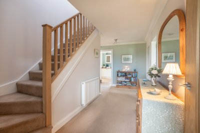 The staircase leading to all three en-suite bedrooms