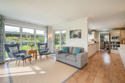 The kitchen and dining area is open plan with a sitting area too