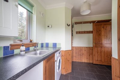 The useful utility room promises all the conveniences of home