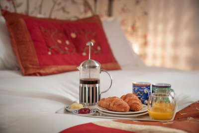 Breakfast in bed while looking out to sea