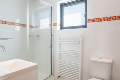 A third spacious bathroom at Snipe Cottage with a large shower