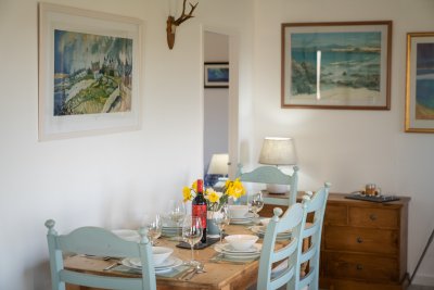 Pretty artworks add lots of charm to this cottage
