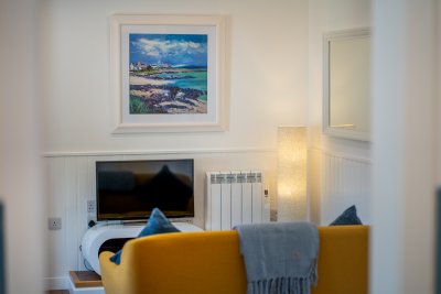Looking into the living area with artwork