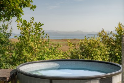 Stunning sea views from the wood-fired hot tub