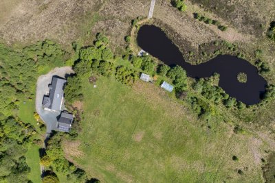 A bird's eye view of Mucmara Lodge and the private loch in its grounds