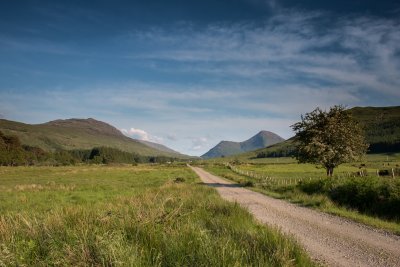 A gravel track leads from the road into the glen to reach Kilbeg Lodge