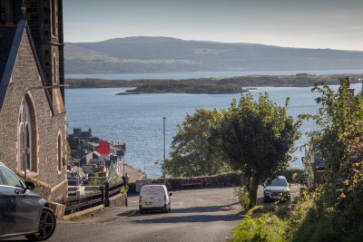 Looking down the hill to Calve Island and Tobermory Bay