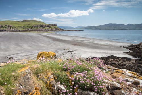 Discover this hidden black sand beach at Traigh na Cille nearby