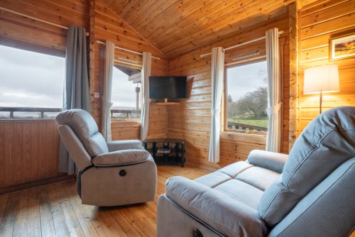 Eas Lodge living area with settees