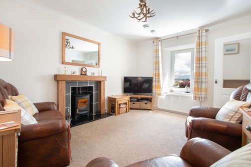 Cosy and comfortable living room at Lilybank Smiddy