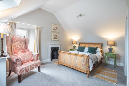 Each bedroom is beautifully furnished with a modern meets antique feel