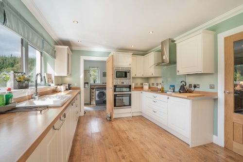 Light floods the roomy kitchen, making it a pleasure to eat in