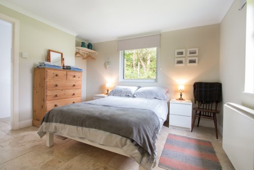 The peaceful double bedroom on the ground floor of the cottage
