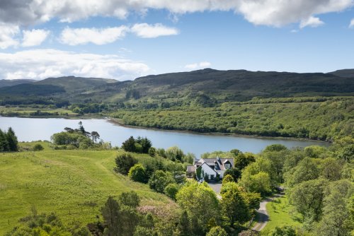 The superb location of Torrbreac overlooking Loch Cuin, with gorgeous sea views